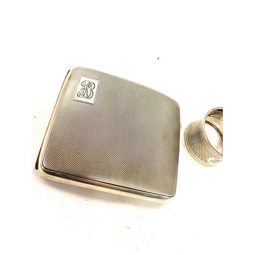 492 - Vintage silver engine turned cigarette case and a silver napkin ring, both hallmarked, total weight ... 