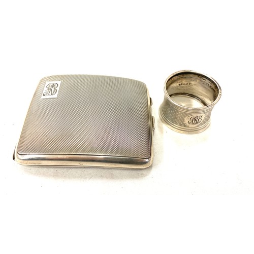 492 - Vintage silver engine turned cigarette case and a silver napkin ring, both hallmarked, total weight ... 