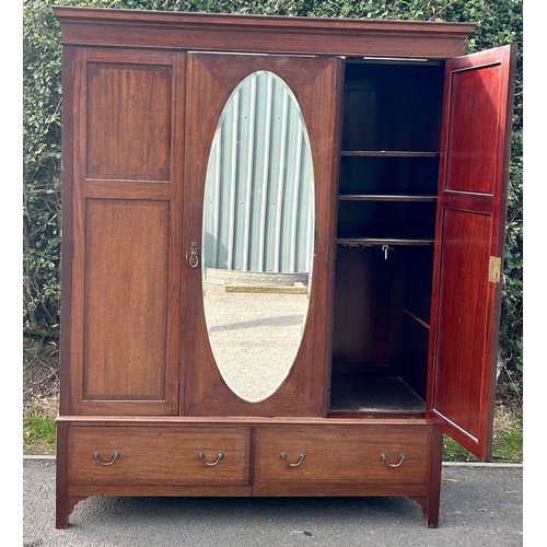 583 - Mahogany triple door mirror front robe, with cornice, boot drawer to base, approximate measurements:... 