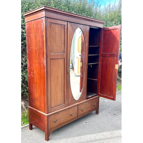 583 - Mahogany triple door mirror front robe, with cornice, boot drawer to base, approximate measurements:... 