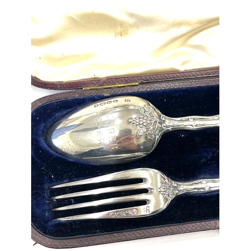 517 - Cased Antique silver christening fork and spoon set