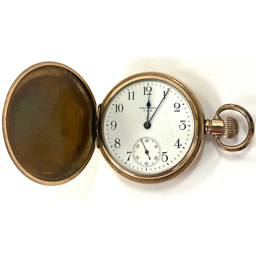 453 - Gold plated Dennison case, full hunter Waltham movement, this has been overwound therefore in need o... 