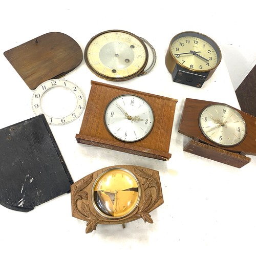 338 - Selection of clock parts spare and repairs