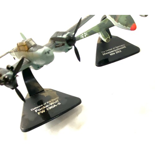 180 - Selection of metal aircraft models on stand includes defence of the reich focke - wulf, Curtis 940 e... 