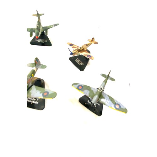 180 - Selection of metal aircraft models on stand includes defence of the reich focke - wulf, Curtis 940 e... 