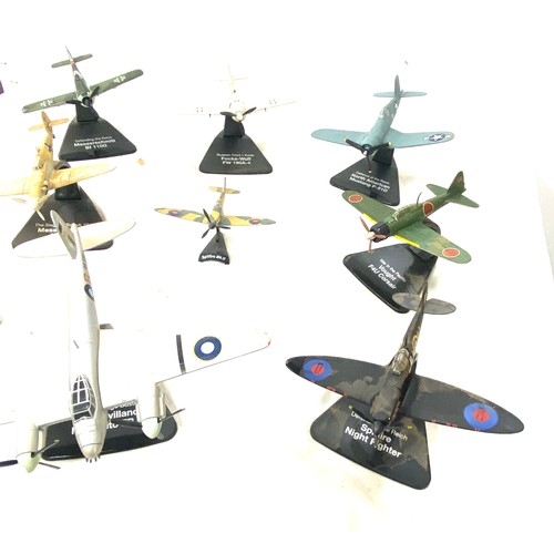 108 - Selection of metal aircraft models on stand includes spitfire night fighter, north american mustang ... 