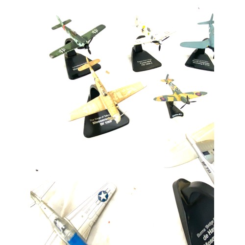 108 - Selection of metal aircraft models on stand includes spitfire night fighter, north american mustang ... 