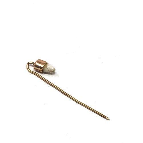 93 - Antique gold tooth set  stick pin measures approx 4.3cm long