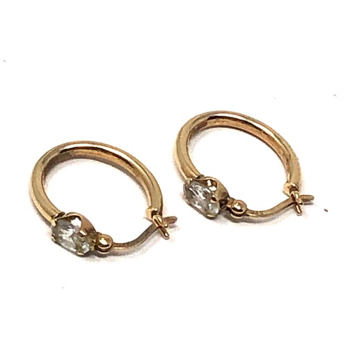 95 - 9ct gold clear stone set earrings weight 1.6g