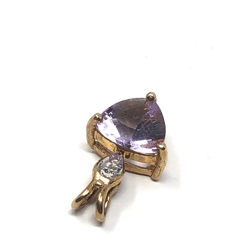 99 - 9ct gold amethyst & diamond pendant measures approx 1.9cm drop weight 1.8g