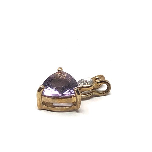 99 - 9ct gold amethyst & diamond pendant measures approx 1.9cm drop weight 1.8g