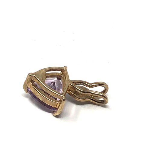 99 - 9ct gold amethyst & diamond pendant measures approx 1.9cm drop weight 1.8g