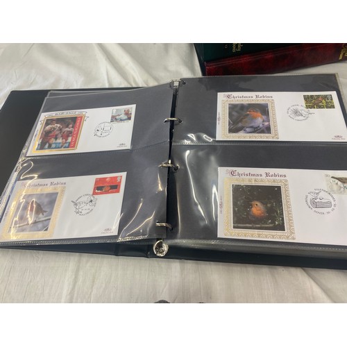 118 - 3 Folders of vintage first day covers includes Domesday 900, The welsh bible, cards at christmas Fir... 