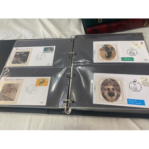 118 - 3 Folders of vintage first day covers includes Domesday 900, The welsh bible, cards at christmas Fir... 