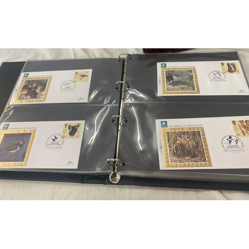 118 - 3 Folders of vintage first day covers includes Domesday 900, The welsh bible, cards at christmas Fir... 