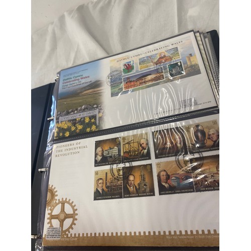 118 - 3 Folders of vintage first day covers includes Domesday 900, The welsh bible, cards at christmas Fir... 