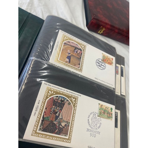 118 - 3 Folders of vintage first day covers includes Domesday 900, The welsh bible, cards at christmas Fir... 