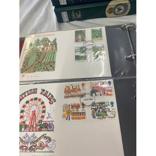 182 - 3 Folders of vintage first day covers includes The Golden Jubilee, Classic Locomotive, Lord of the r... 