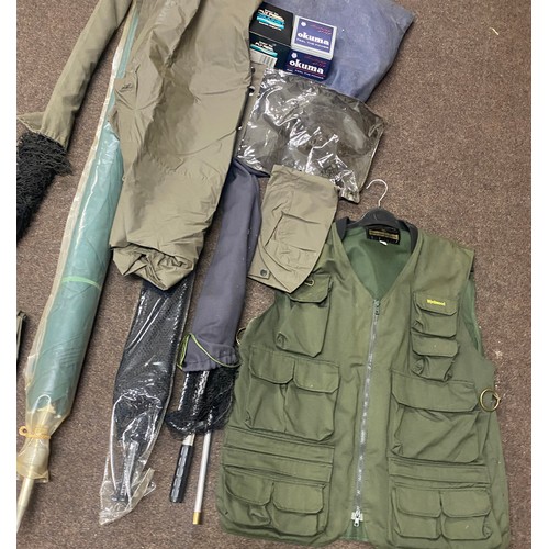 281 - Selection of fishing equipment includes Wychwood  Gilet, nets, landing net, umbrella, etc