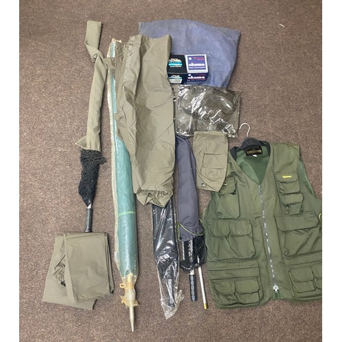 281 - Selection of fishing equipment includes Wychwood  Gilet, nets, landing net, umbrella, etc