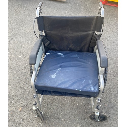 587 - Folding wheel chair