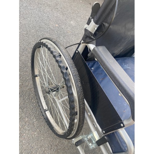 587 - Folding wheel chair