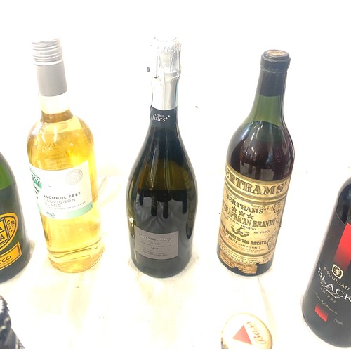 103 - Selection of assorted alcohol includes Harveys, wine, Prosecco etc