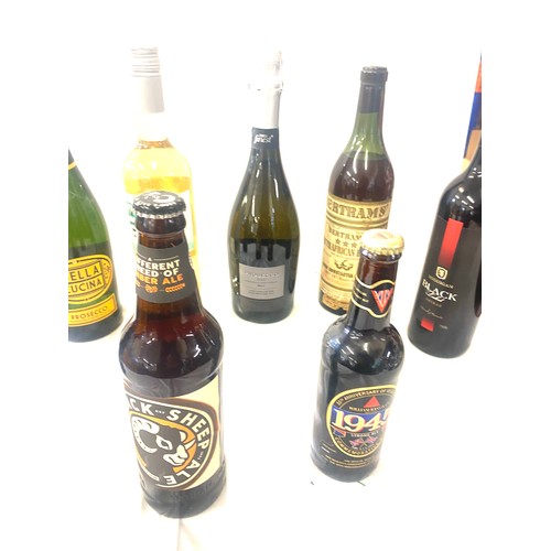 103 - Selection of assorted alcohol includes Harveys, wine, Prosecco etc