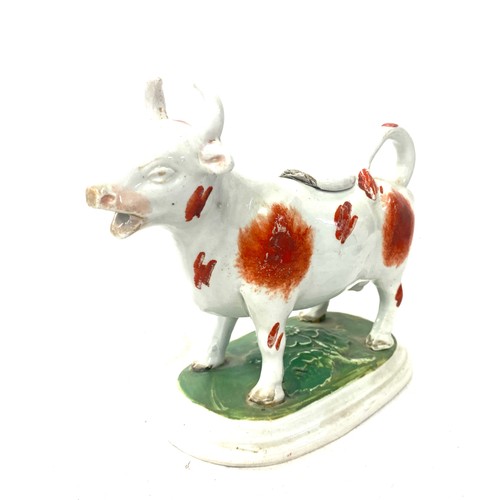 111 - Set of 2 Staffordshire creamer cows