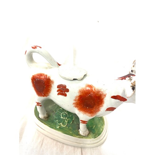 111 - Set of 2 Staffordshire creamer cows