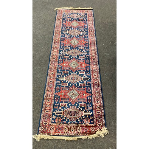 291 - Caucasian rug runner measures approx 28 inches wide 88 inches long