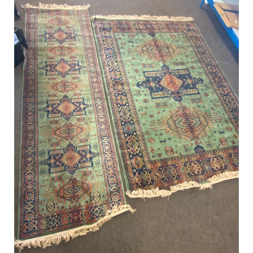 381 - Caucasian rug runner and a rug largest measures measures approx 55 inches by 83 inches