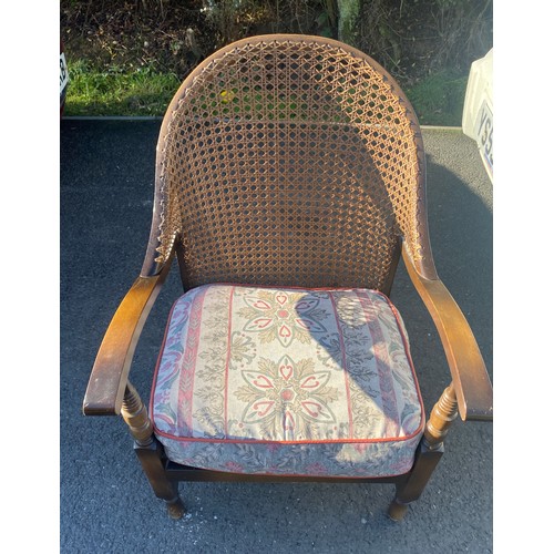 383 - Vintage bergere chair measures approx 33inches tall 22 inches wide and a Vintage footstool