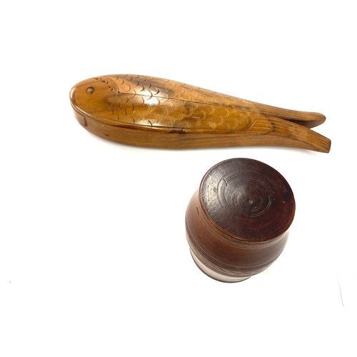 76 - Two pieces of treen- wooden nutcracker in the form of a fish and a small wooden barrel with twist of... 