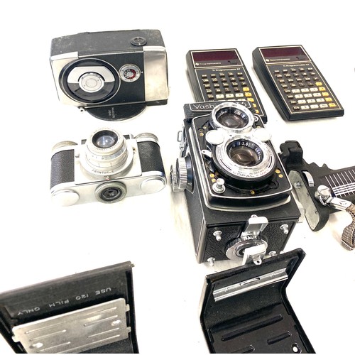 253 - Large selection of assorted camera equipment includes Yashica 24 body parts, Paxetts 35mm camera etc