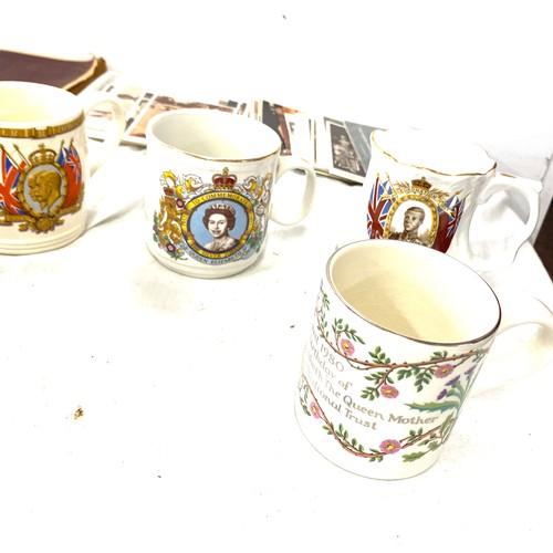 173 - Selection of commemorative ware includes postcards, cups etc