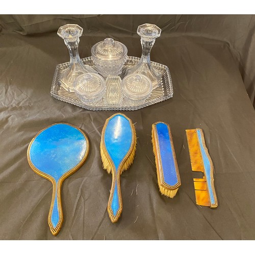 294 - Glass dressing table set and a vintage brass and enamel dressing table set