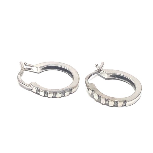 228 - 9ct white gold diamond hoop earrings (2.1g)