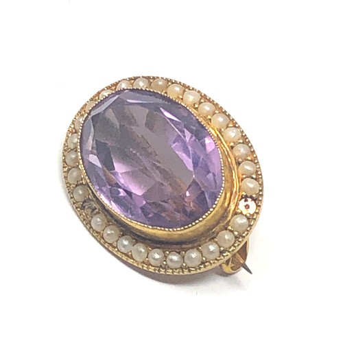 224 - 9ct gold antique amethyst & seed pearl brooch-missing small pearl  (4.3g)