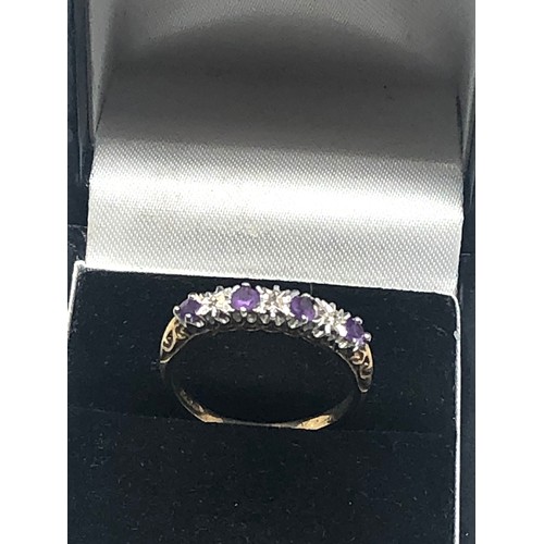 229 - 9ct gold diamond & amethyst ring (1.8g)