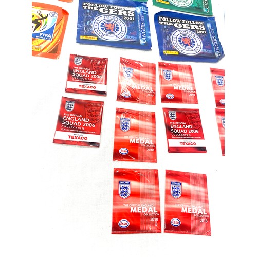 354 - Brand new in packs Football medals and stickers, Panini fifa world cup 2010 Africa stickers, Rangers... 