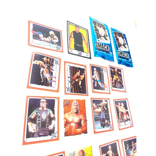 565 - Selection of WWF/WWE 2022 merlin stickers and smackdown WWE 2 booster packs