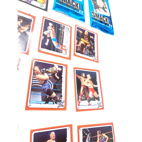 565 - Selection of WWF/WWE 2022 merlin stickers and smackdown WWE 2 booster packs