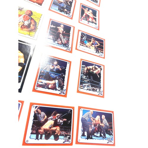 565 - Selection of WWF/WWE 2022 merlin stickers and smackdown WWE 2 booster packs