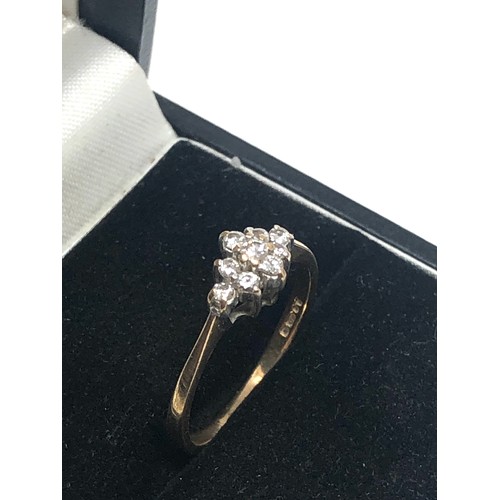 235 - 9ct gold diamond cluster ring (1.4g)