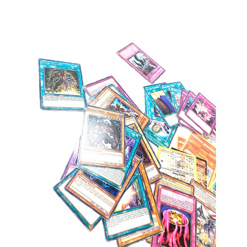 468 - Large selection of collectors cards includes Pokemon, Yu Gi Oh holos etc