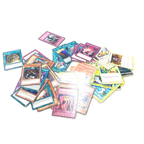 468 - Large selection of collectors cards includes Pokemon, Yu Gi Oh holos etc