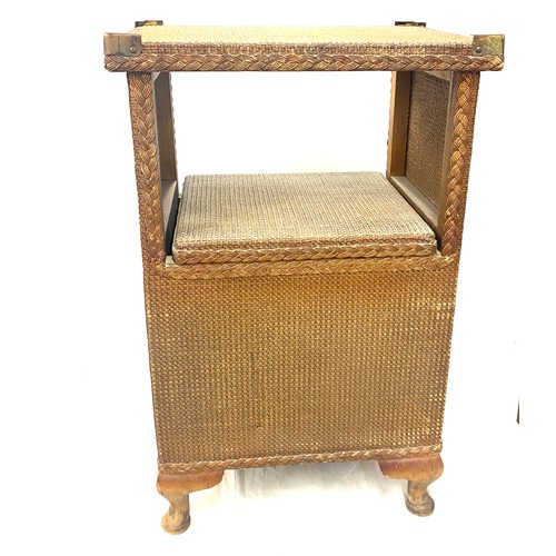 600 - Vintage wicker bathroom cabinet measures approx 35 inches tall 15 inches wide