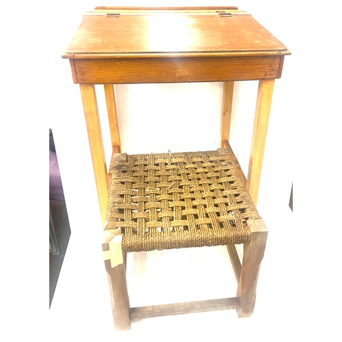 594 - Vintage childs school desk and a wicker foot stool