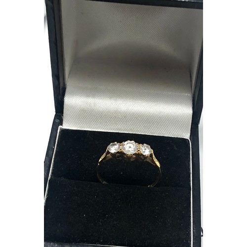 226 - 18ct gold zircon trilogy ring (1.7g)